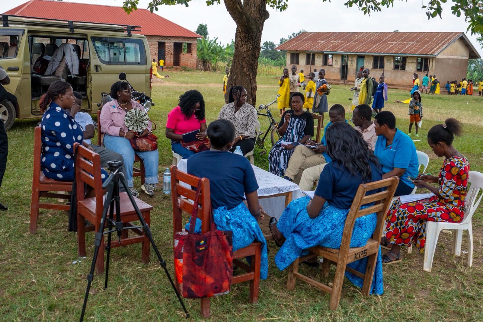 Team Research Officers from AHF-Ug conducting a community dialogue 